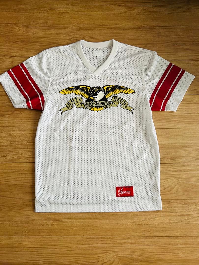 トップス supreme anti hero football