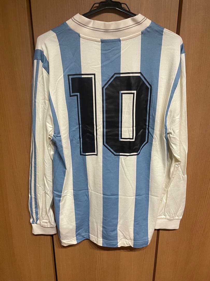 アディダスオリジナルス アルゼンチン 代表1986復刻ユニフォームシャツ