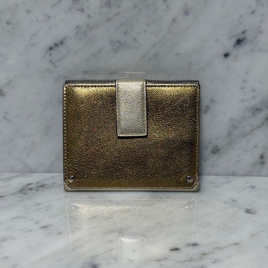 サルヴァトーレフェラガモ ゴールド シルバー 二つ折り財布 ガンチーニ