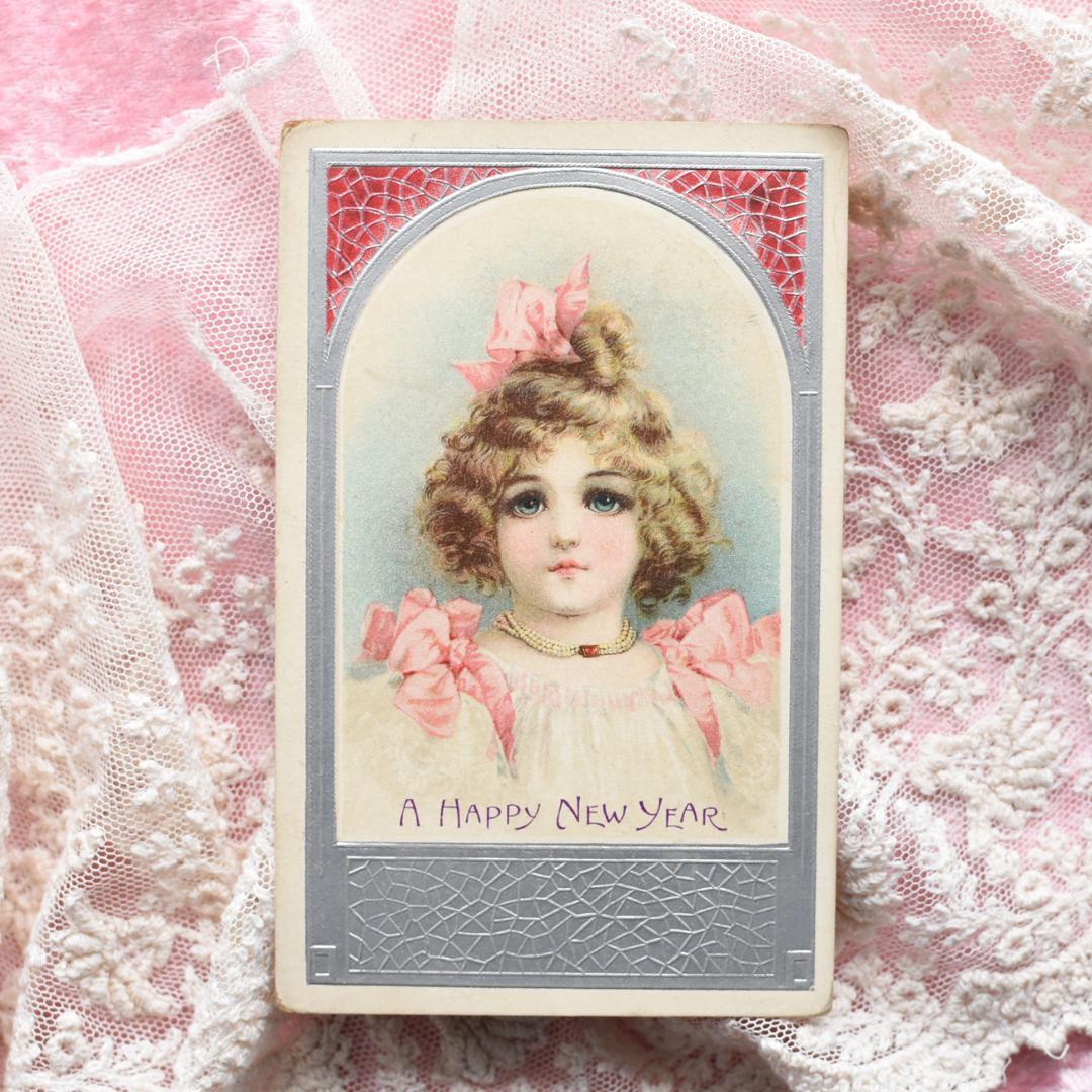 *アンティークポストカード　ピンクリボンの愛くるしい少女　　ブランデージ