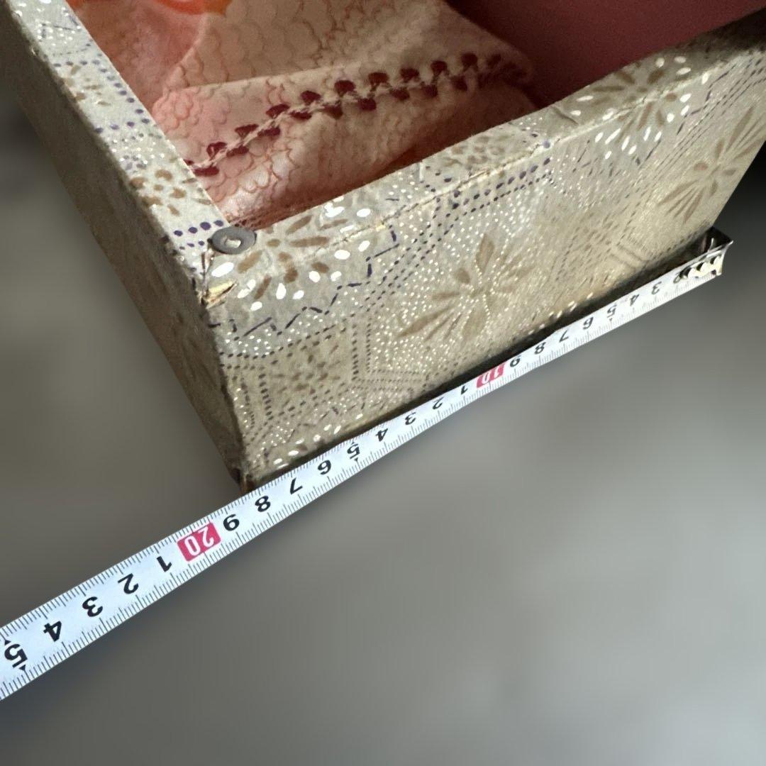 曰く付き…オレンジ色の和装ドレス日本人形