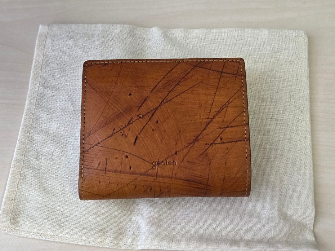 ゲンテン　エクバターナ　三つ折り財布　コニャック
