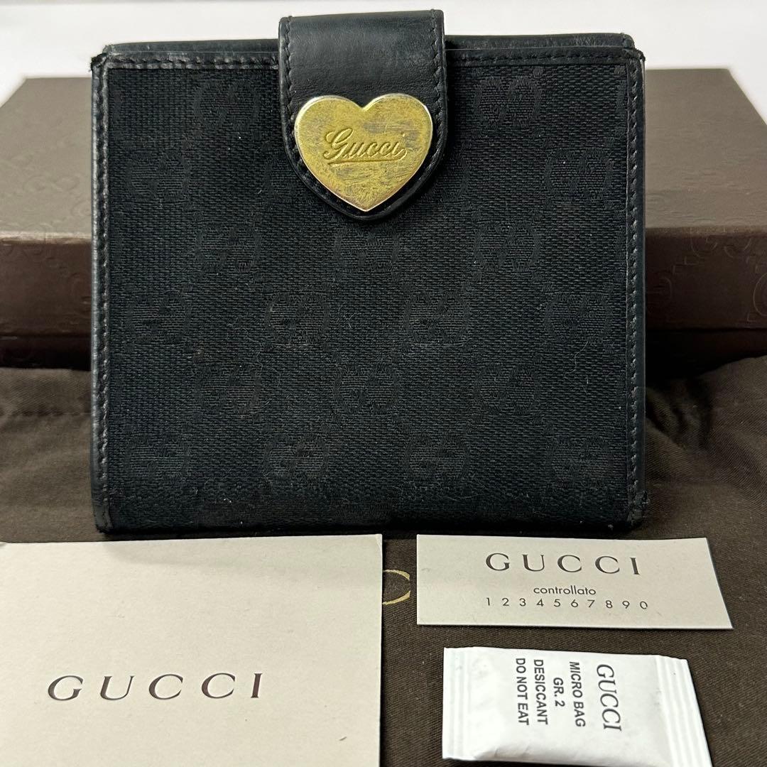 新品同様‼️ グッチ　GUCCI 財布　折り財布　GGキャンバス ハート金具