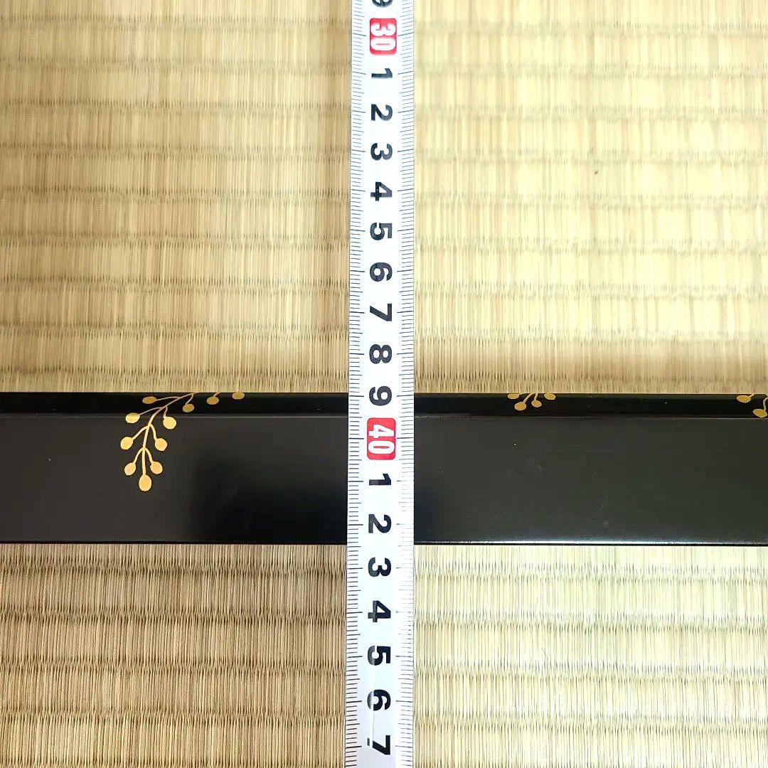 炉縁　塗師哲山作　踊桐蒔絵