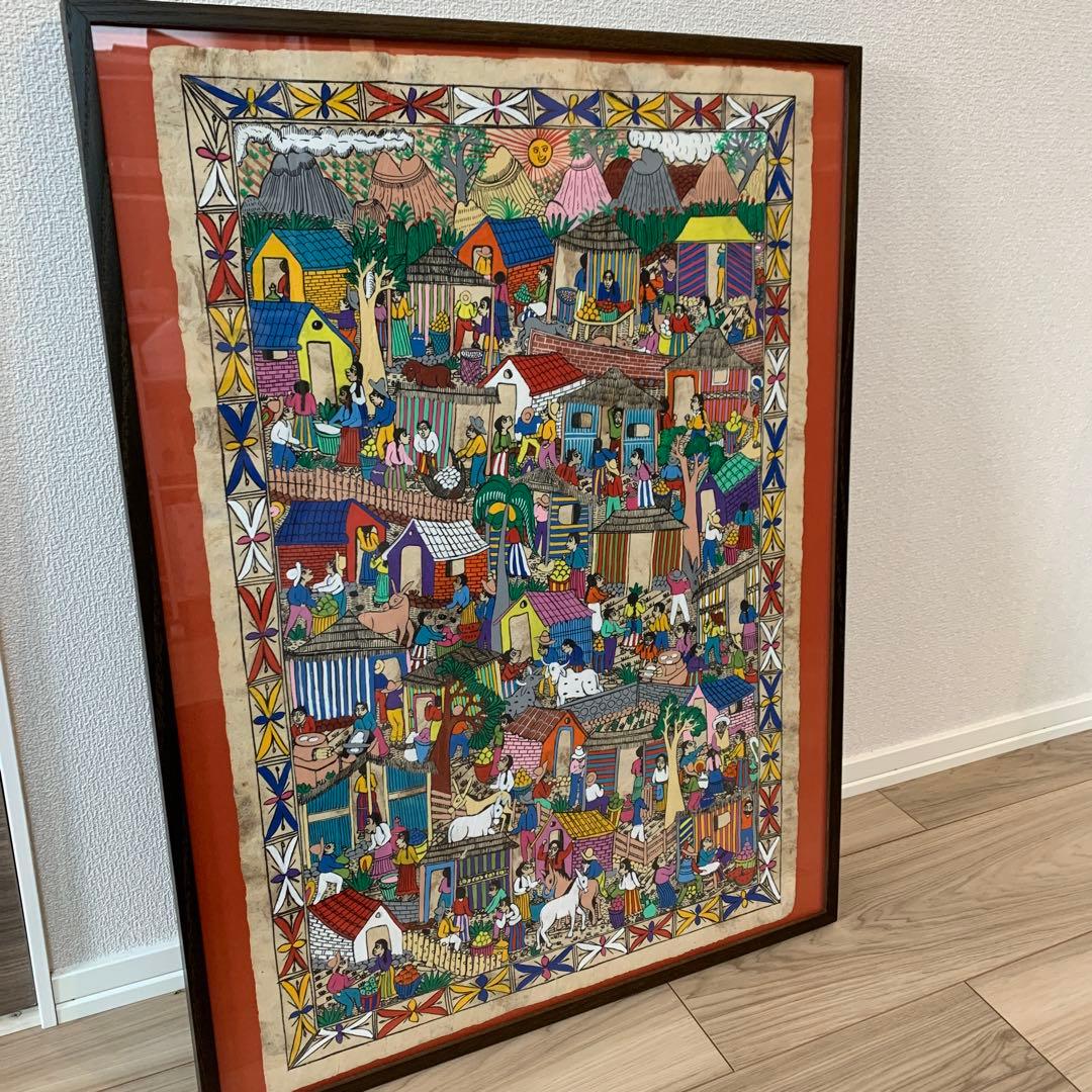 メキシコの村落　カラフルな民俗画