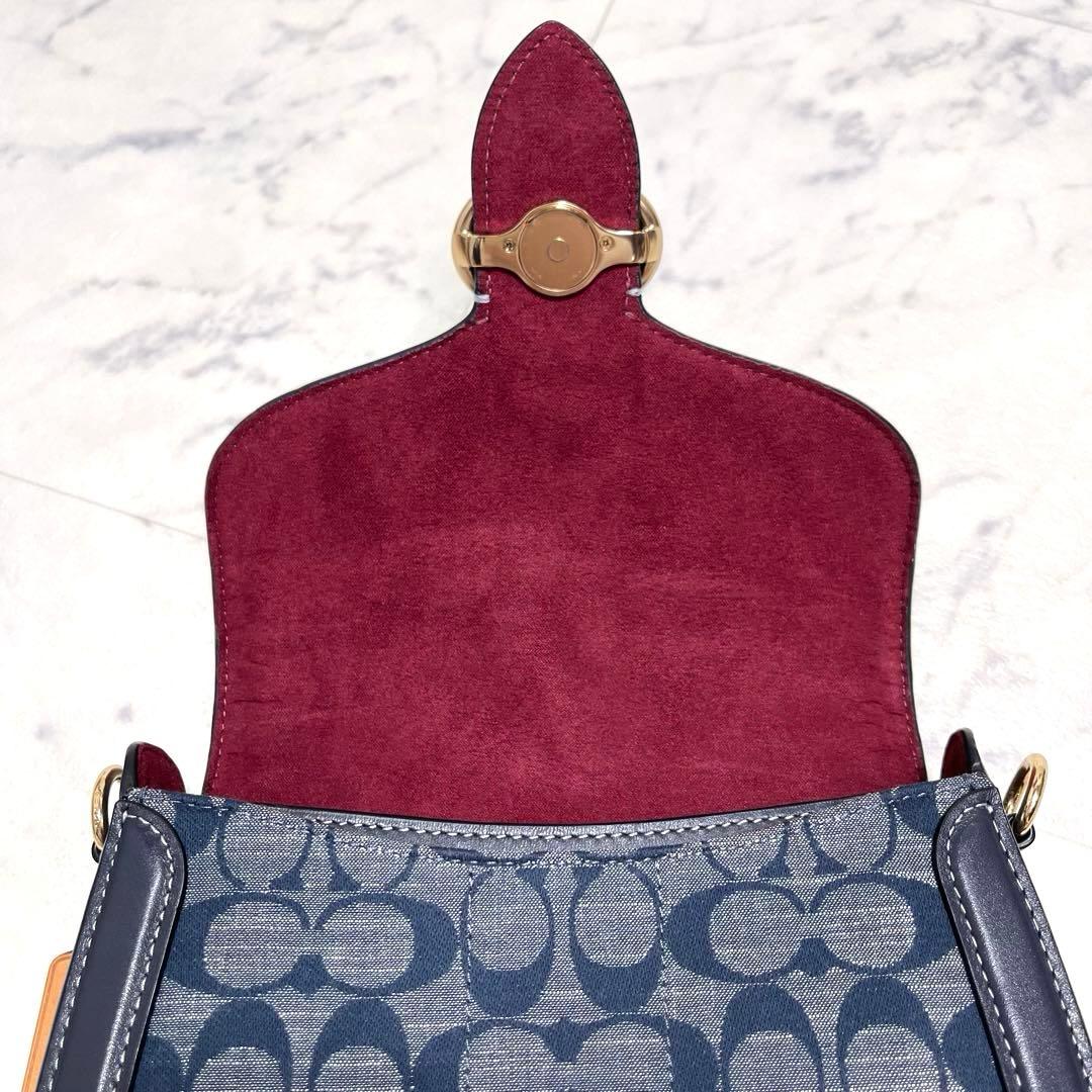 マイメロ✨コーチ ショルダーバッグ ジョージー サドルバッグ シグネチャー