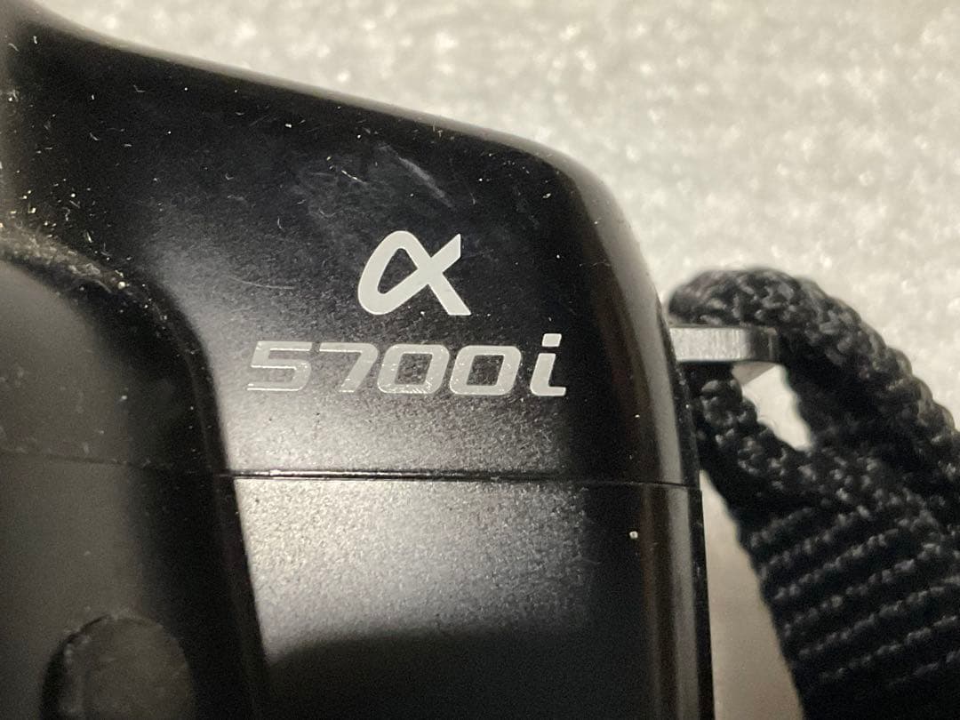 MINOLTA／アルファー・5700i。【シグマレンズ付き。持ち手僅かにキズ】。