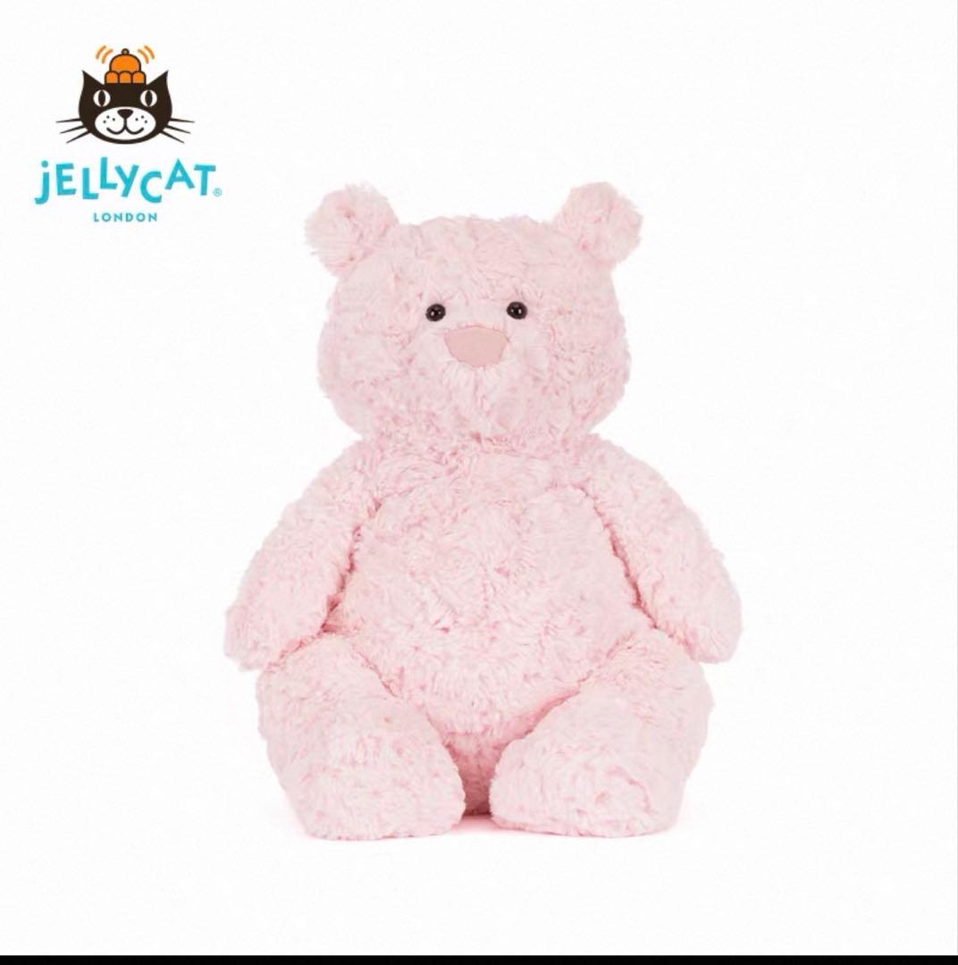 ピンクのクマのぬいぐるみ