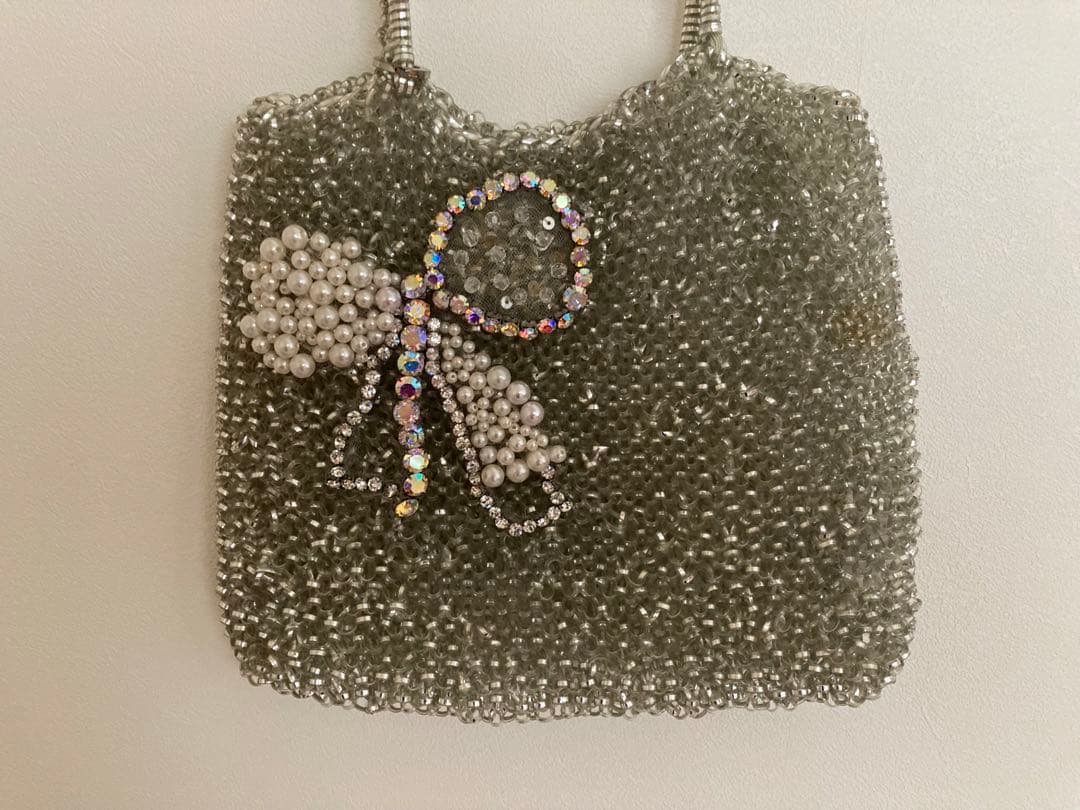 【美品】アンテプリマ　ビーズ装飾リボンモチーフ　ワイヤーバック