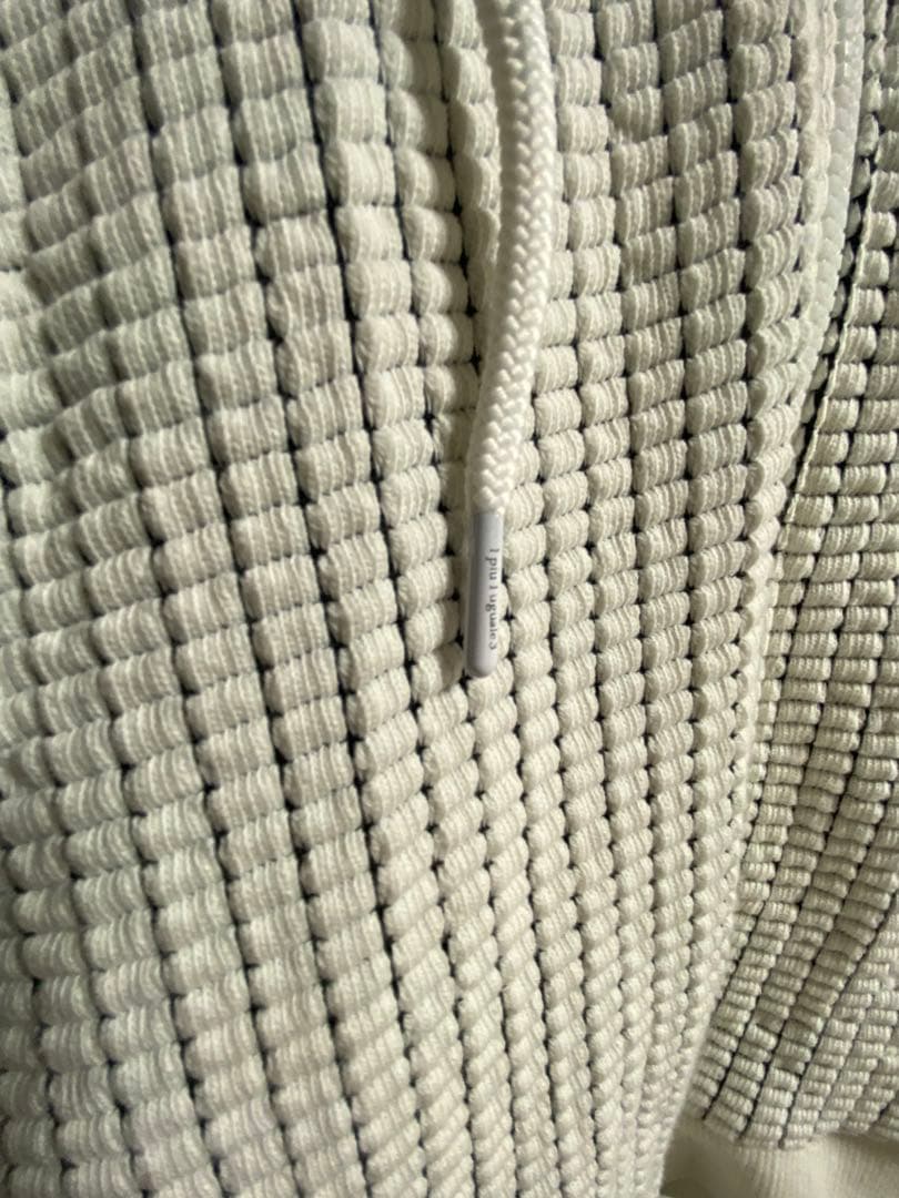 1PIU1UGUALE3 RELAX ランダムロゴワッフルリブパーカー