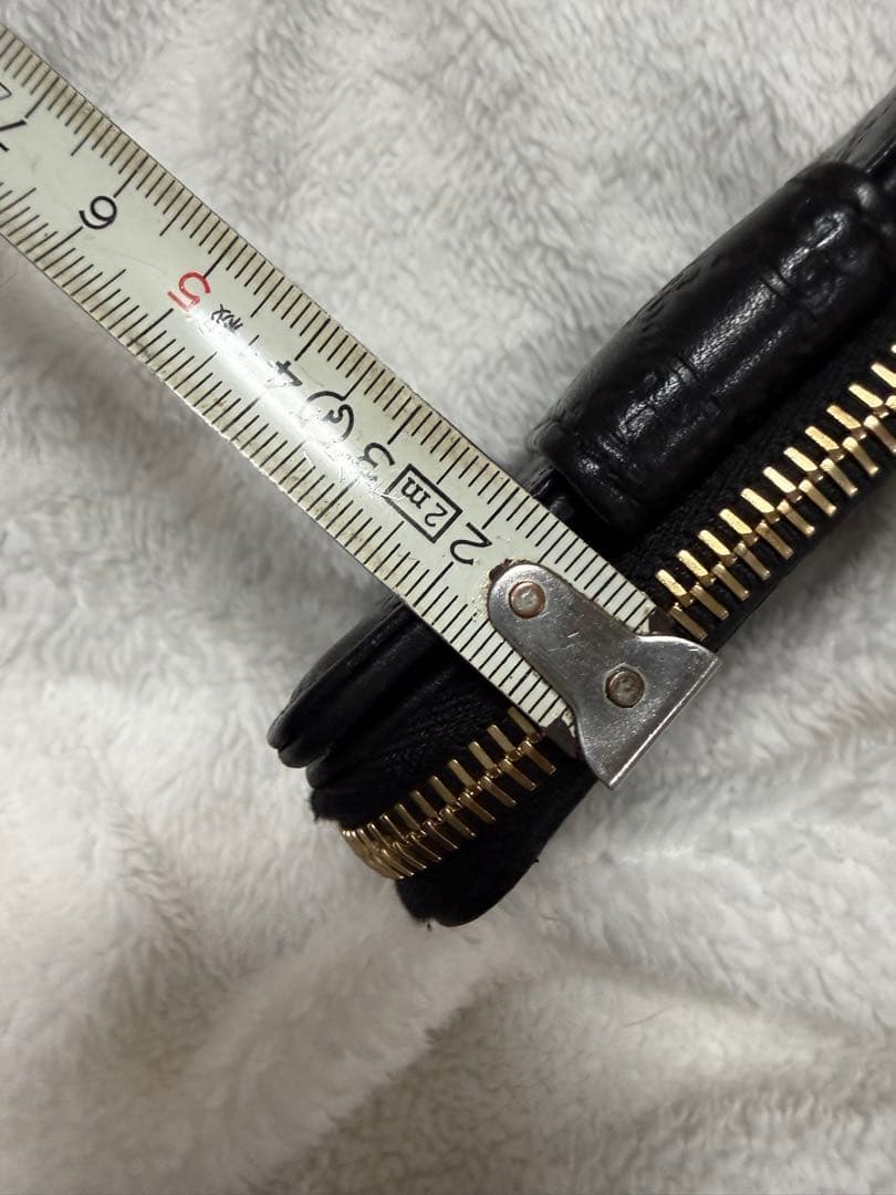 未使用GUCCI 二つ折り財布 ロゴプレート マイクロGG シマレザー 黒